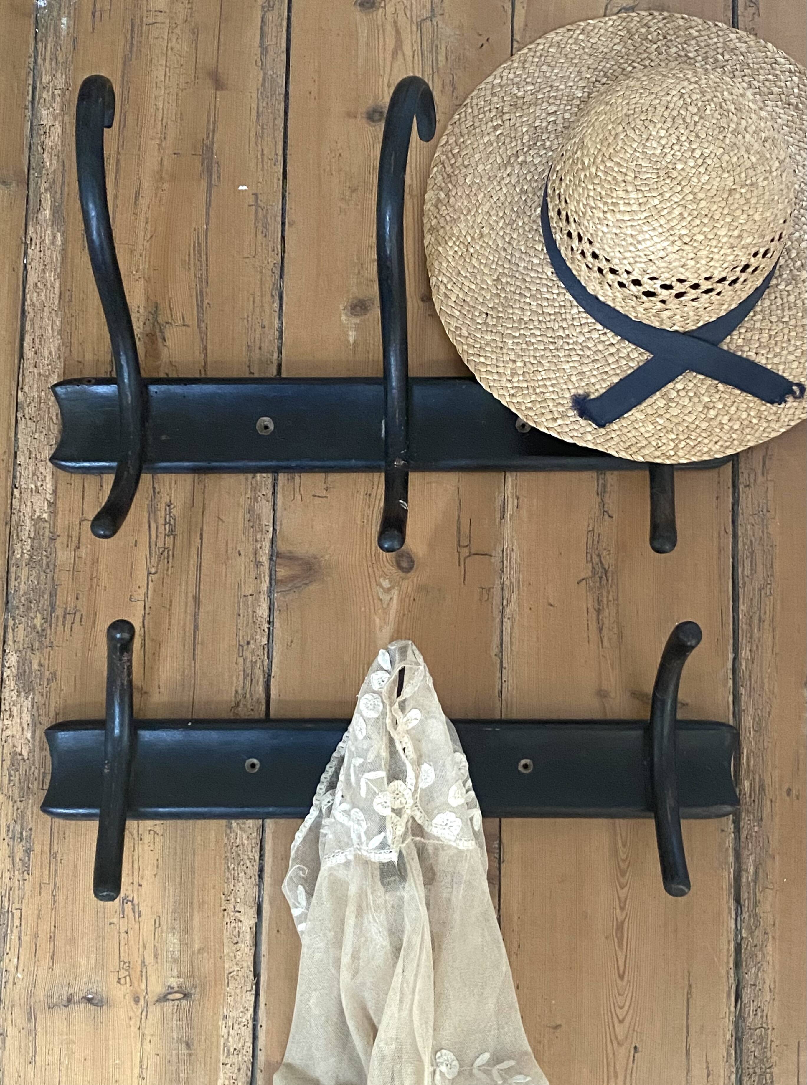 Old black curved wooden coat rack