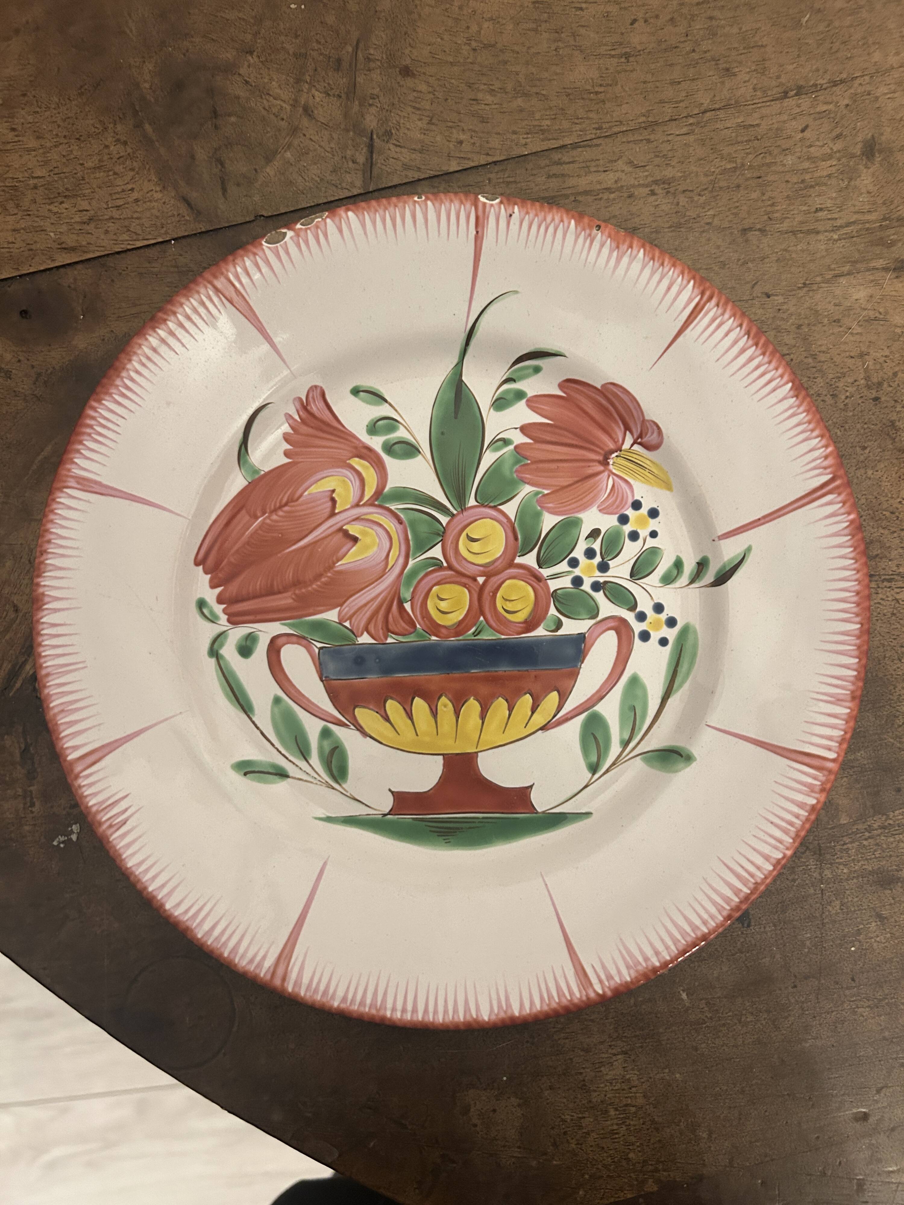 Three earthenware plates from Les Islettes, 18th century