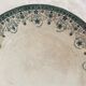 Round serving dish in iron earth