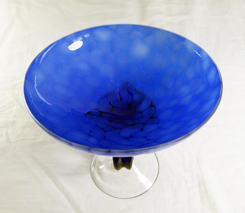 Blue glass cup on foot