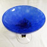 Blue glass cup on foot