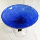Blue glass cup on foot