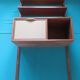 Wall shelving system and teak writing box. of Poul Cadovius. Denmark 1960