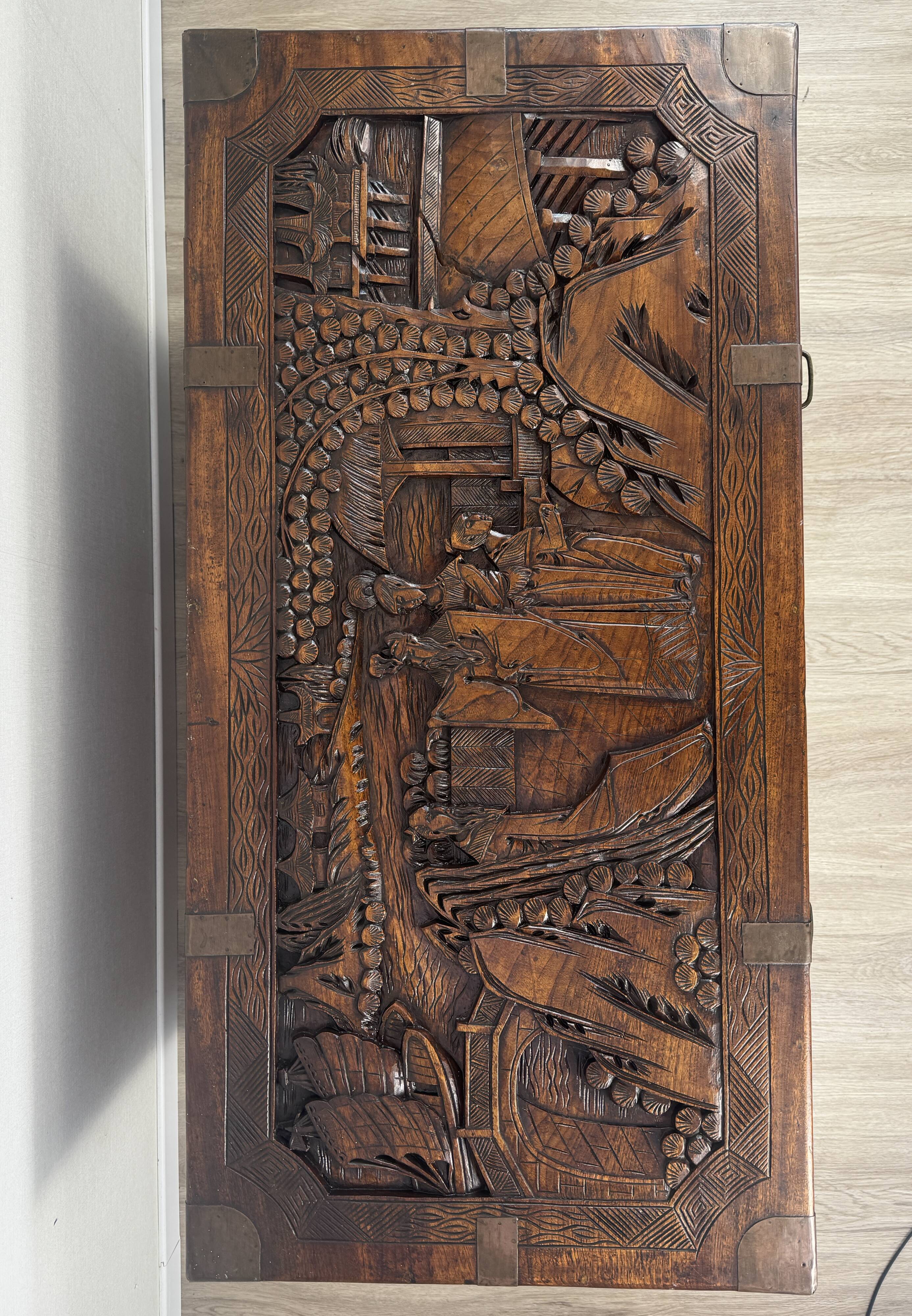 Chinese carved chest made of solid wood — life scenes in bas-relief