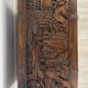 Chinese carved chest made of solid wood — life scenes in bas-relief