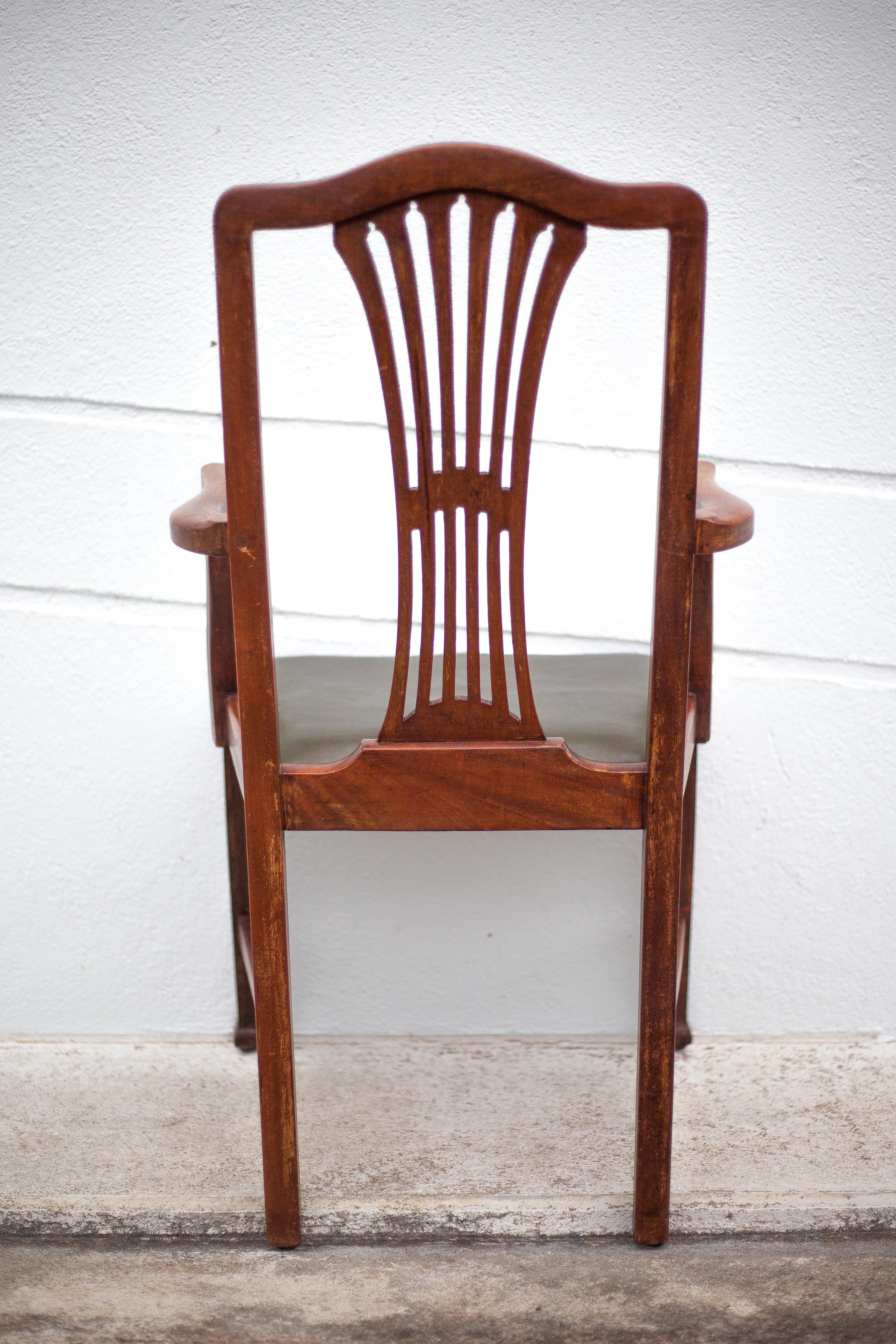 Art Nouveau armchair, wooden armchair with green leather seat, guimard style legs, living room, library