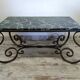 Wrought iron and marble coffee table