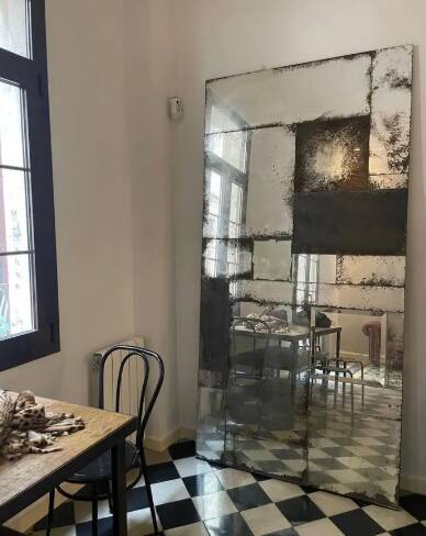 Handcrafted industrial mirrors made to measure with an authentic hand-aged finish, L without a frame.