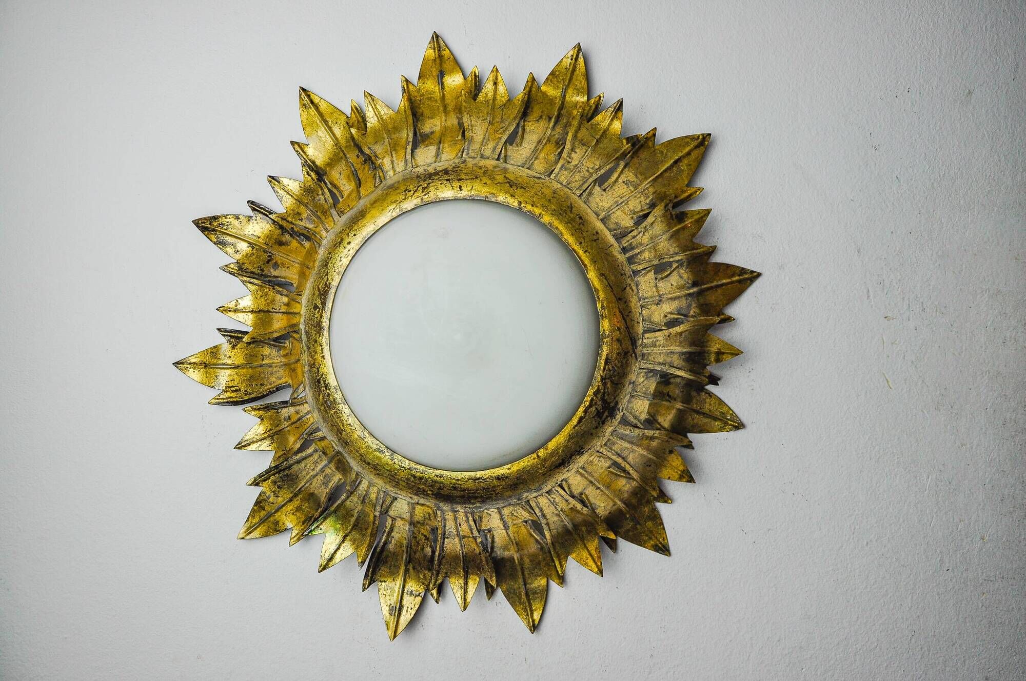 Sun wall lamp by ferro arte, metal and gold leaf, Spain, 1960