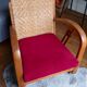 Ancien fauteuil bas colonial style Art Déco en bois.