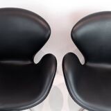 A pair of Swan chairs, model 3320, designed by Arne Jacobsen in 1958