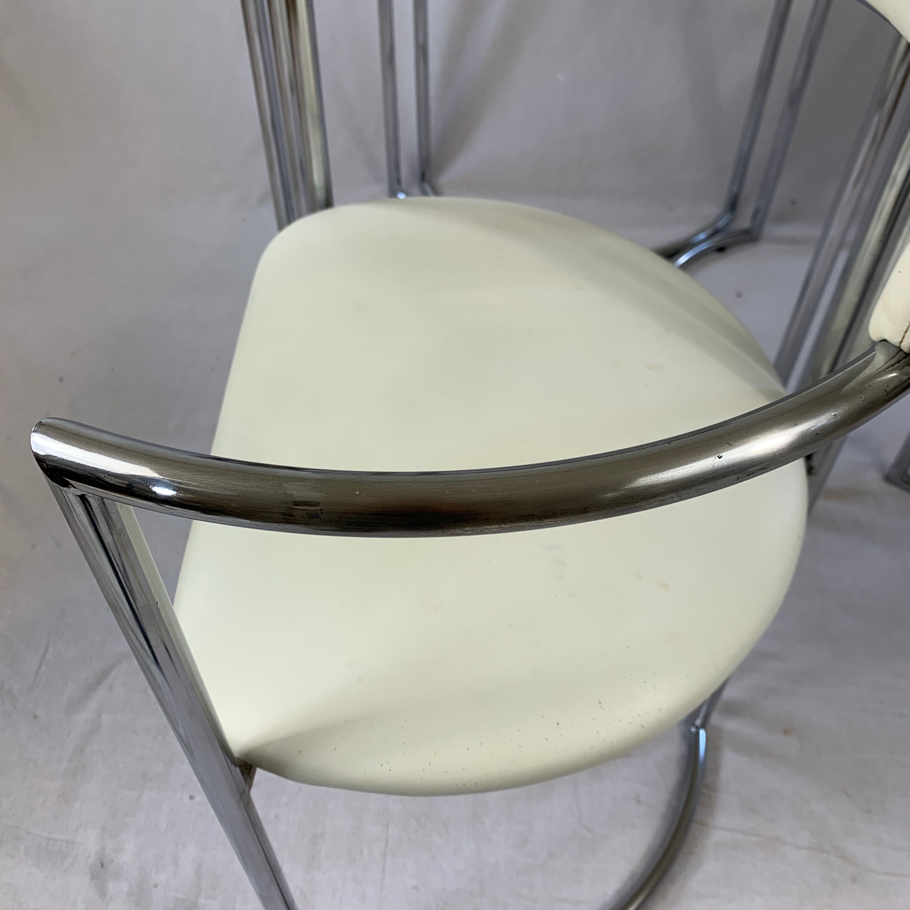 Chrome table and two modernist chairs