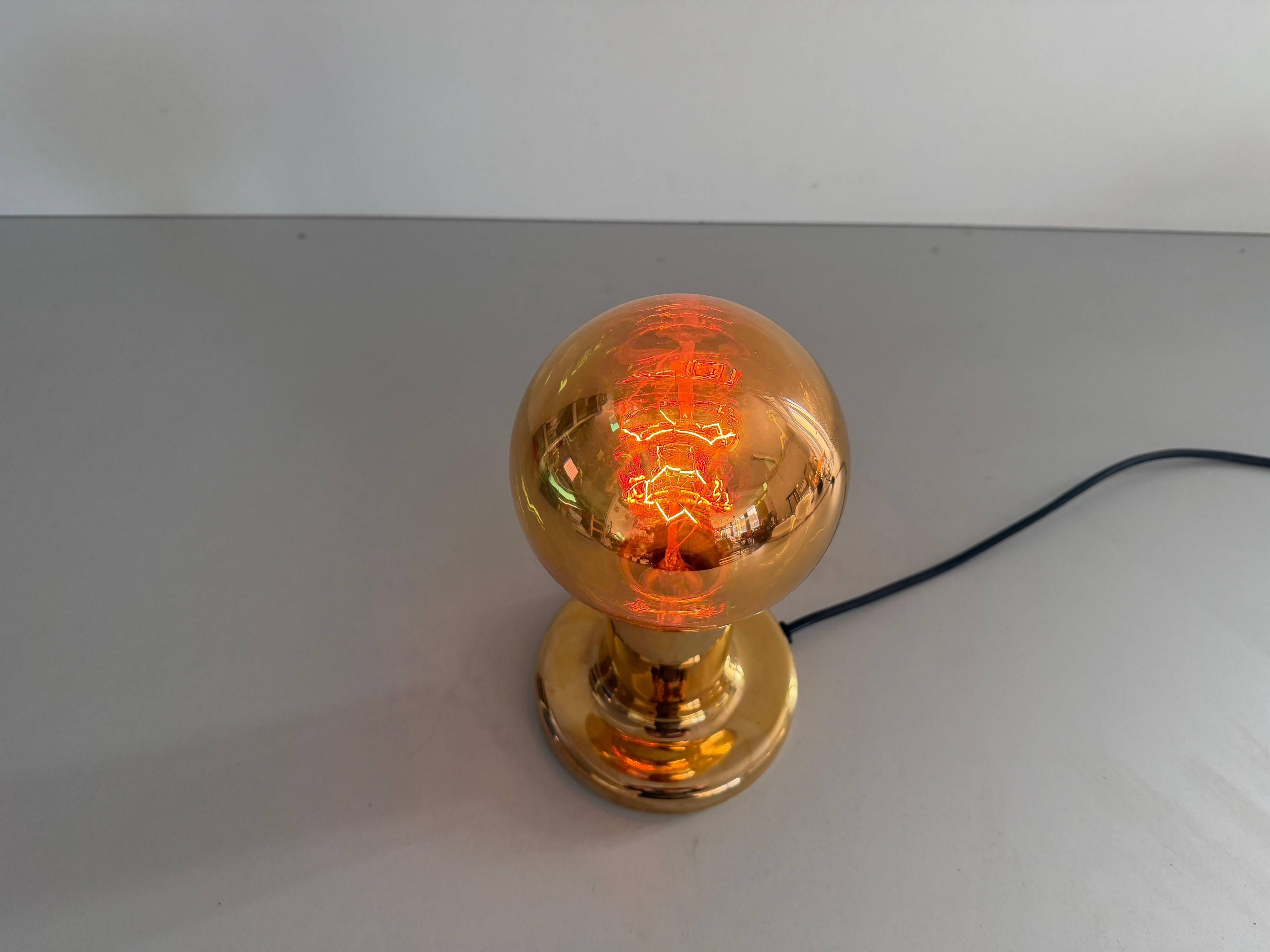 Simple table lamp in gilded porcelain by Philips NTD, 1960s, Germany.