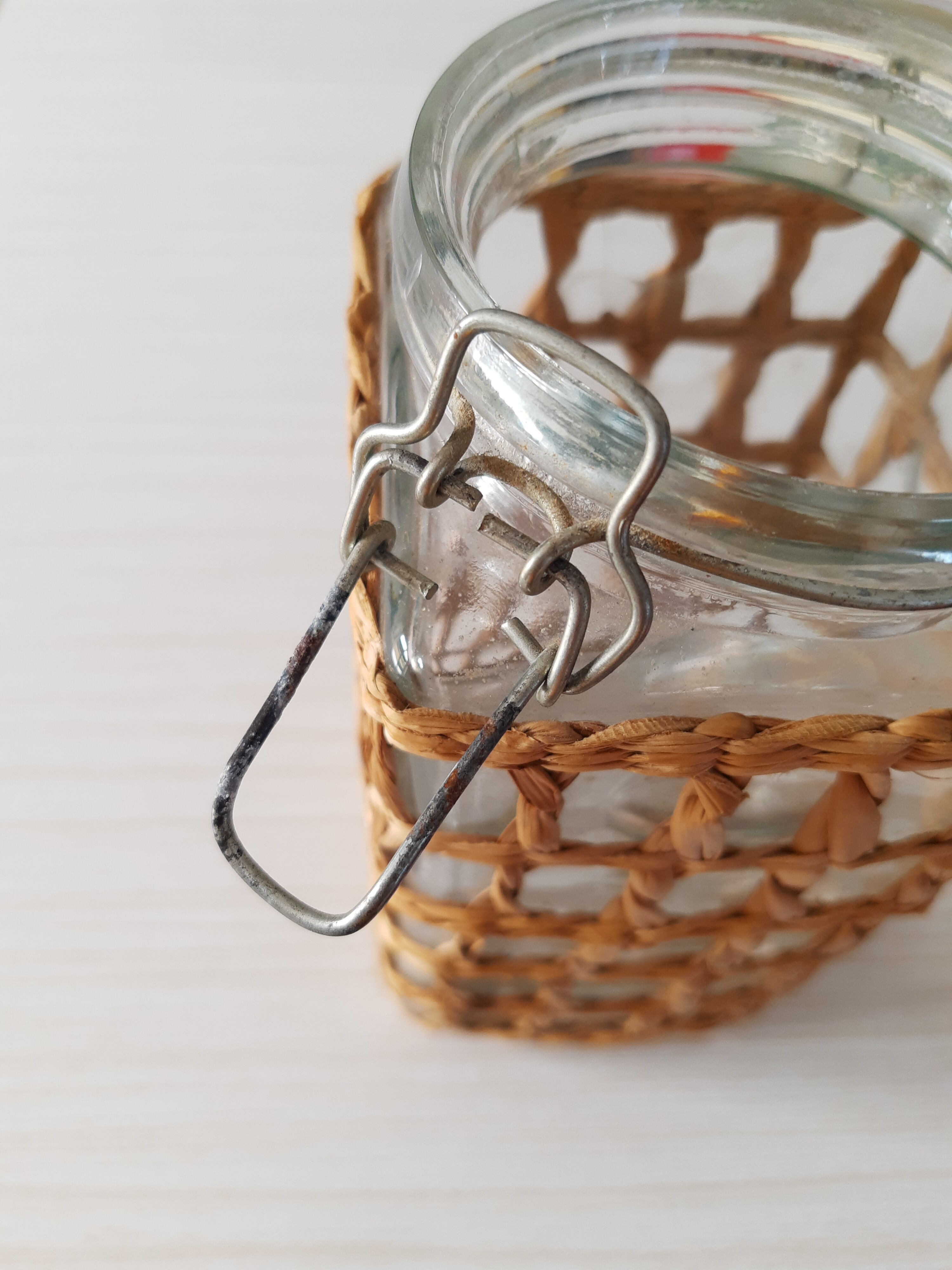 Pair of glass jars and rush