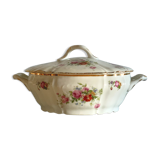 Antique porcelain soup bowl with floral decoration and golden border