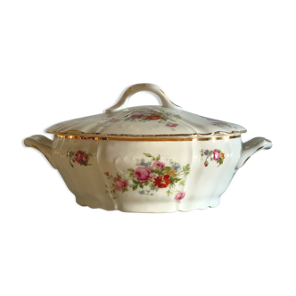 Antique porcelain soup bowl with floral decoration and golden border