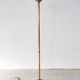 Halogen floor lamp in golden brass