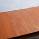 Extendable teak dining table by Gérard Guermonprez for Magnani editions