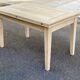 Rectangular farmhouse dining table, extendable, solid wood.