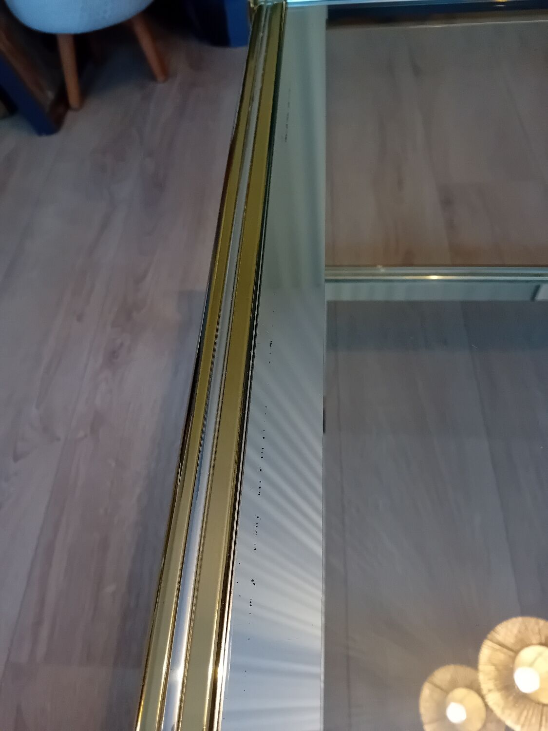 Glass and golden brass coffee table