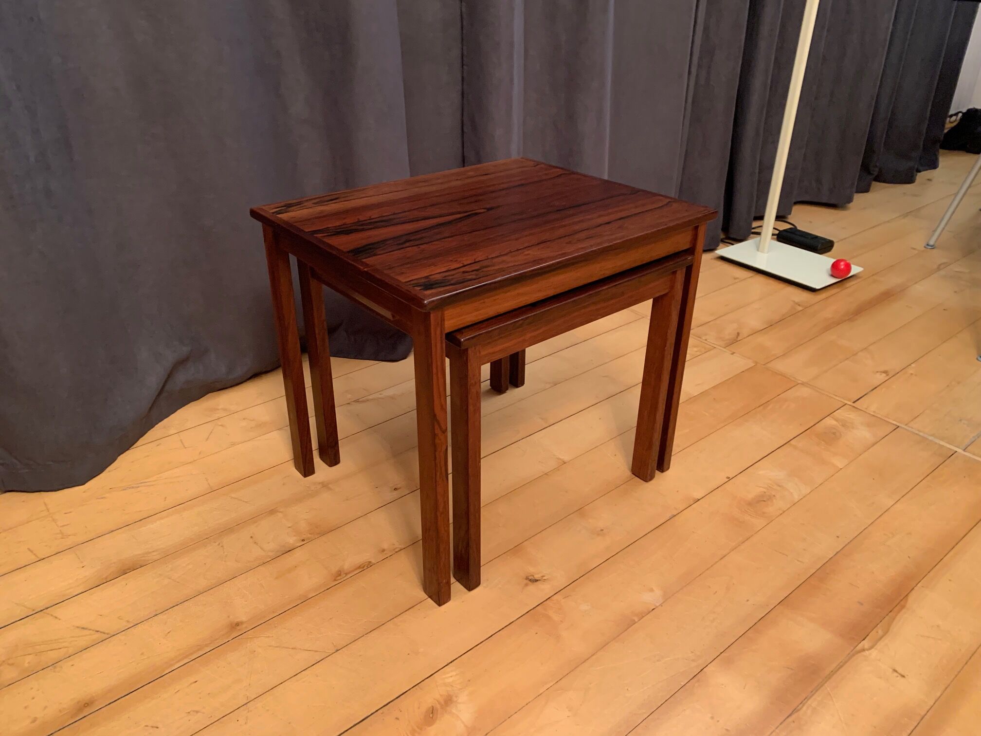 A pair of Kvalitet Form Funktion rosewood side tables Denmark 1960s