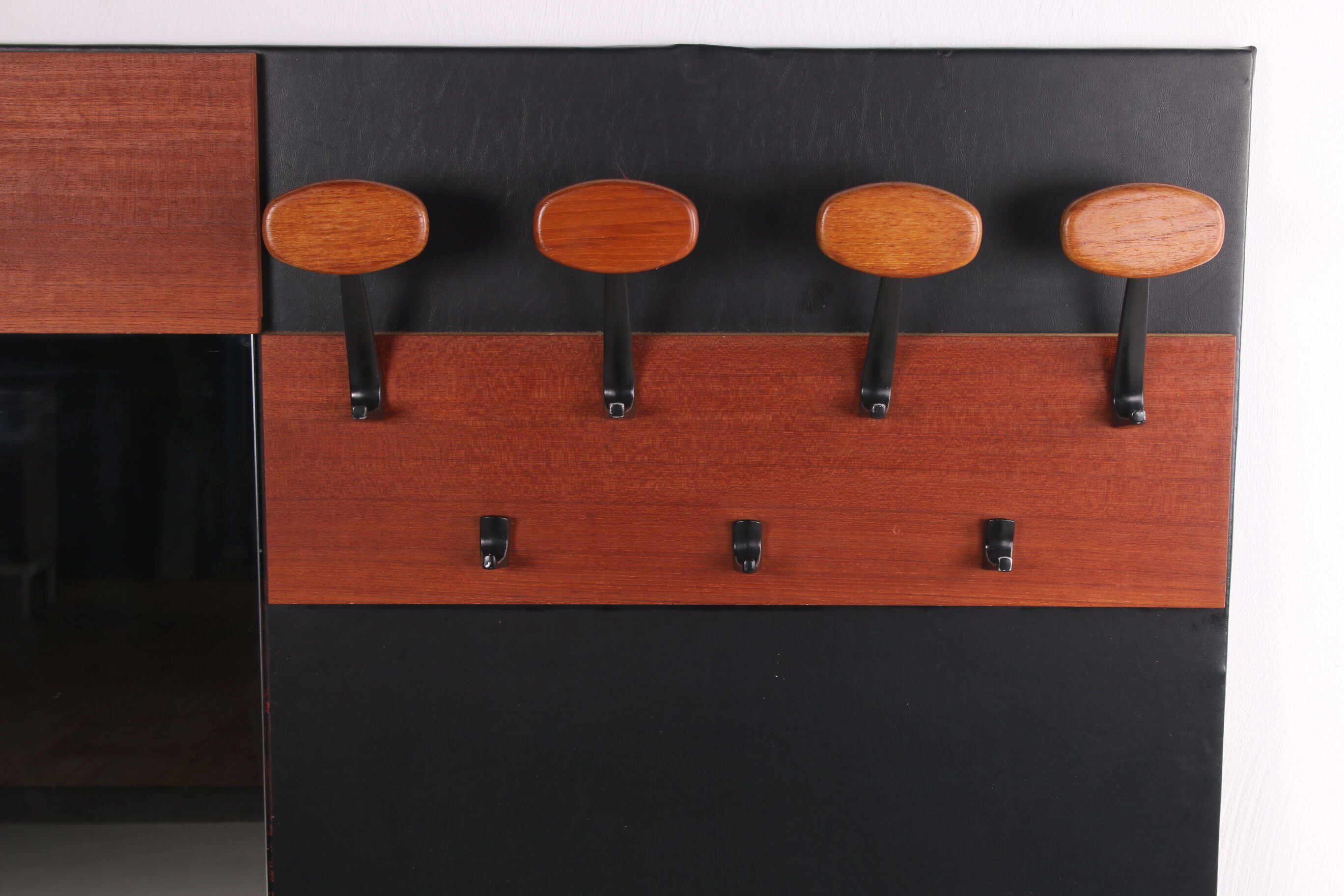 Vintage wardrobe with mirror and hooks from the 60s