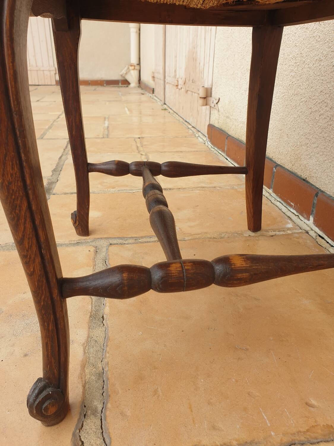 Regency chairs in straw-studded oak