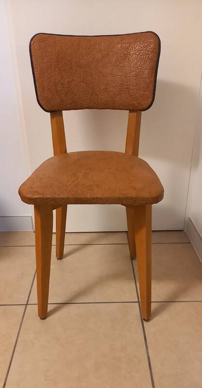 Set of 4 vintage chairs in solid beech and caramel faux leather.