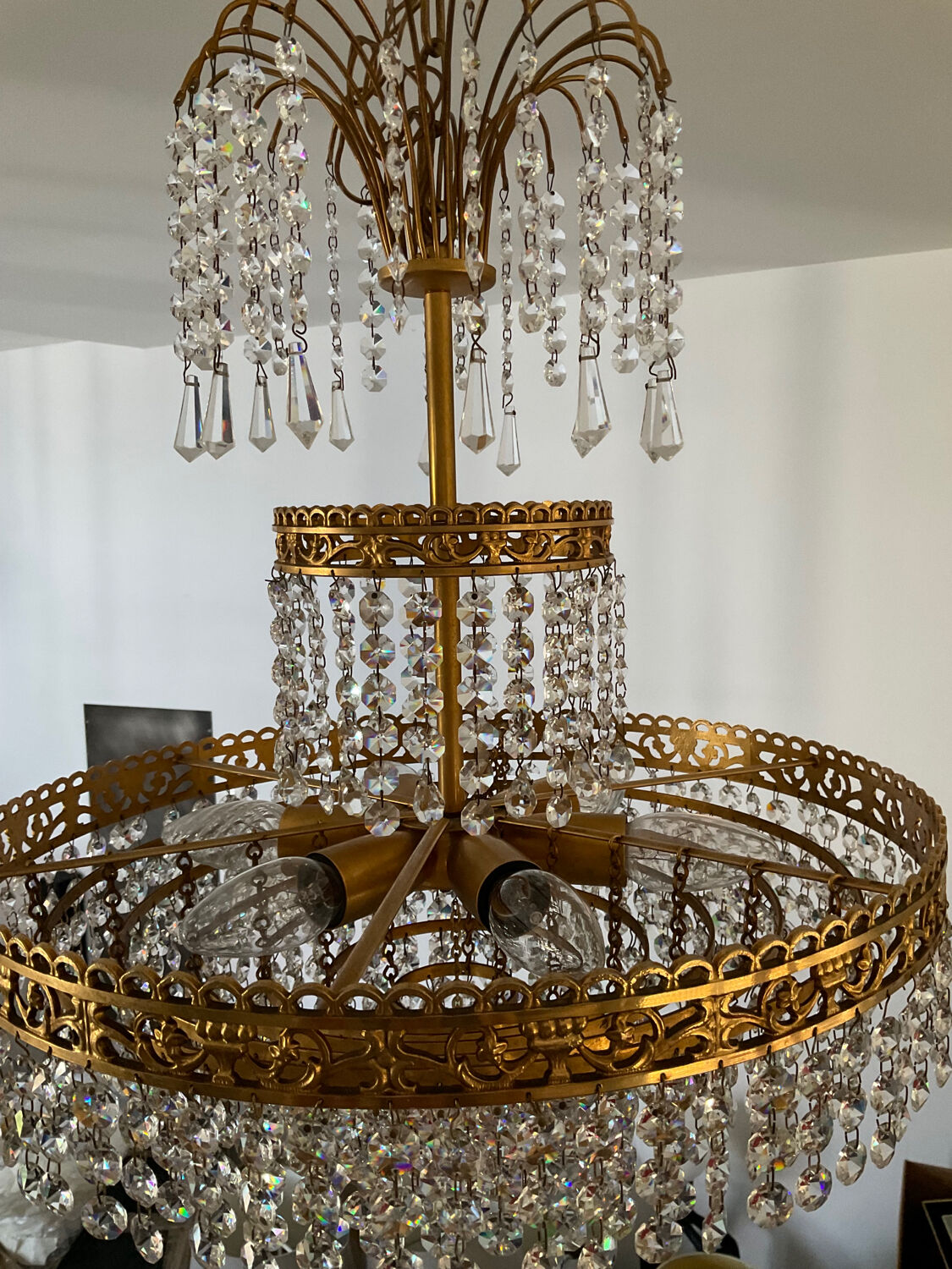 Cascade chandelier with crystal and bronze tassels