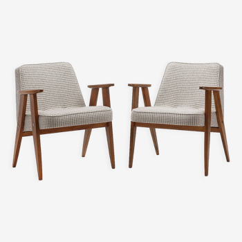 Pair of 366 armchairs