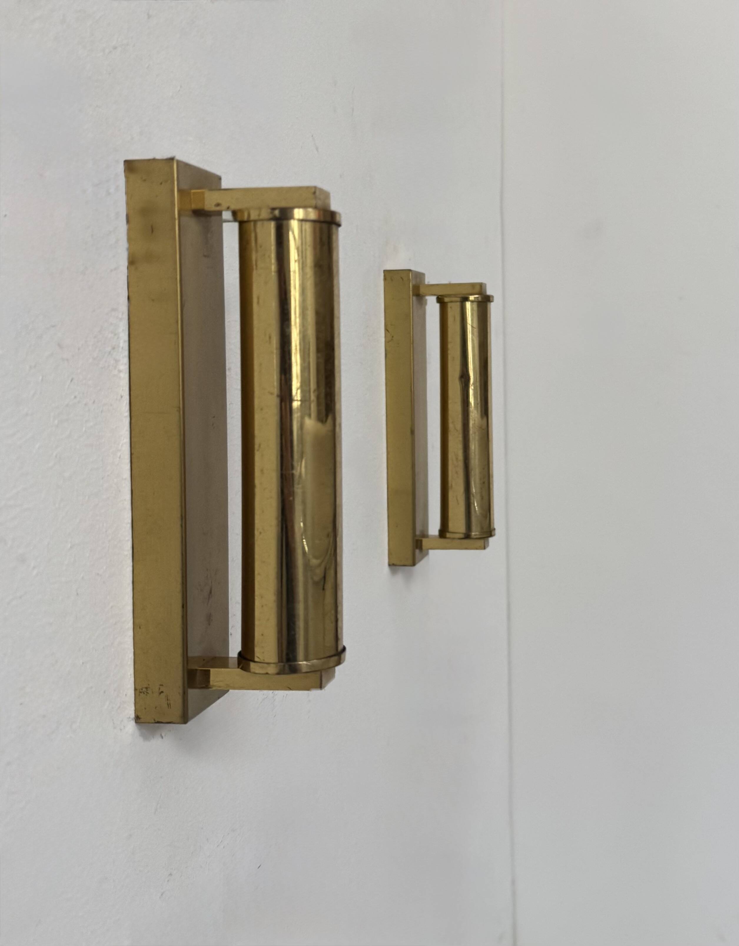 Pair of vintage modernist adjustable wall lights, brass, France 1970.