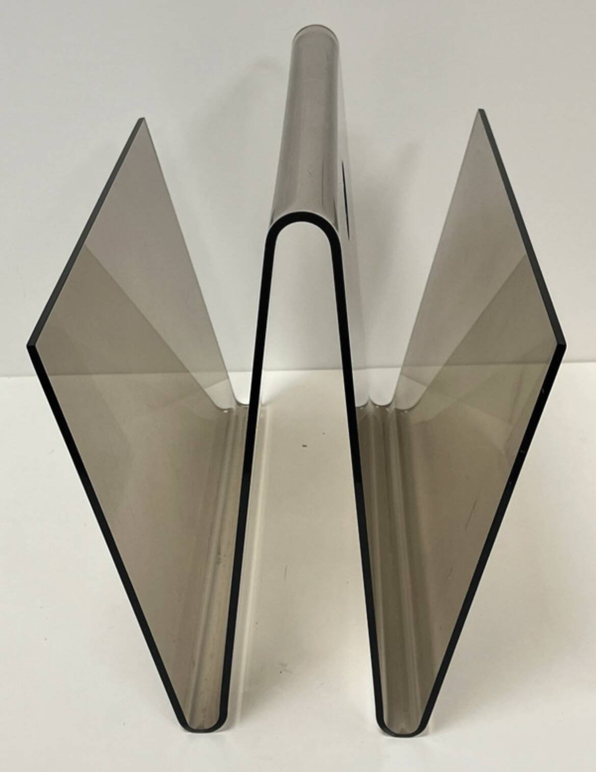 Smoked plexiglass magazine rack in the style of Michel Dumas, France, 1970s.