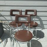 3 Chaises en skaï marron chocolat des années 1960-1970, estampillées.