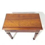 Small old side table with brass finishes