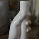 Candle holder for ceramic hand candle