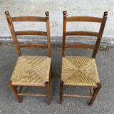 2 solid wood and straw chairs