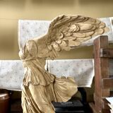 "Winged Victory of Samothrace", beige plaster statuette