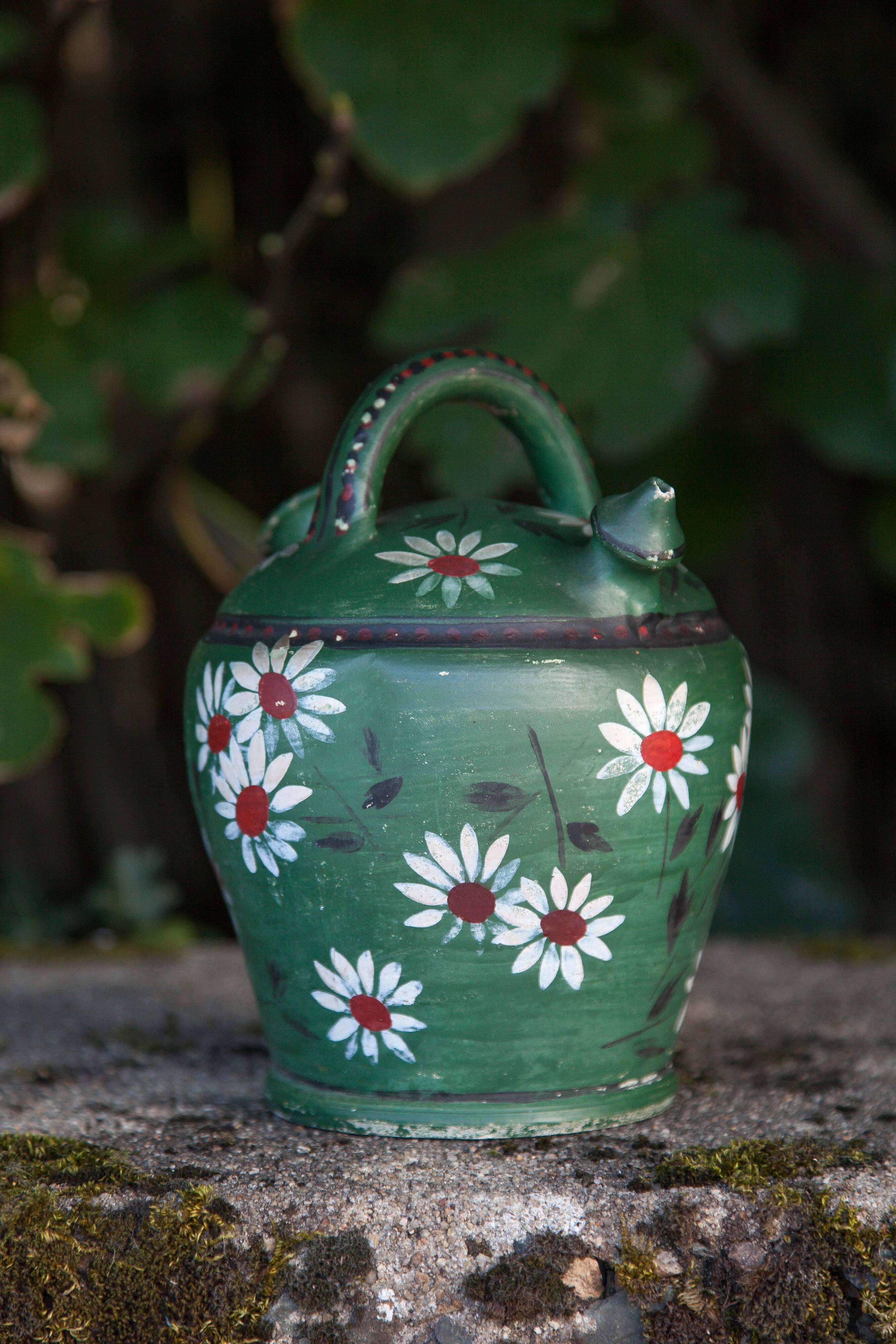Vintage gargoulette, jug, green painted pitcher with daisy patterns