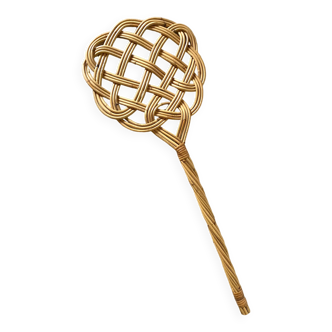 Braided wicker carpet beater