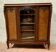 Louis XV style bookcase in mahogany and burr walnut, 20th century