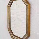 Octagonal mirror in Venetian style with gold-rimmed parecloses