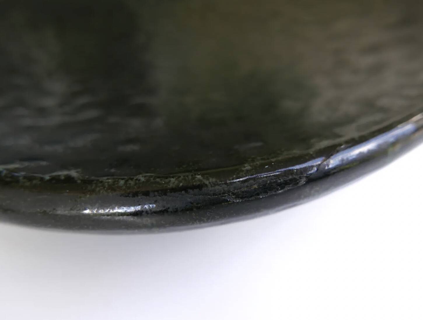 Round Accolay plate in black ceramic, 1960s centrepiece.
