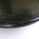 Round Accolay plate in black ceramic, 1960s centrepiece.