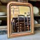 Louis Philippe mirror in gilded stucco ☐ 63.5 x 51 cm
