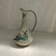Old pitcher in Dutch-made earthenware signed