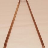 Old bronze or brass fireplace clamp