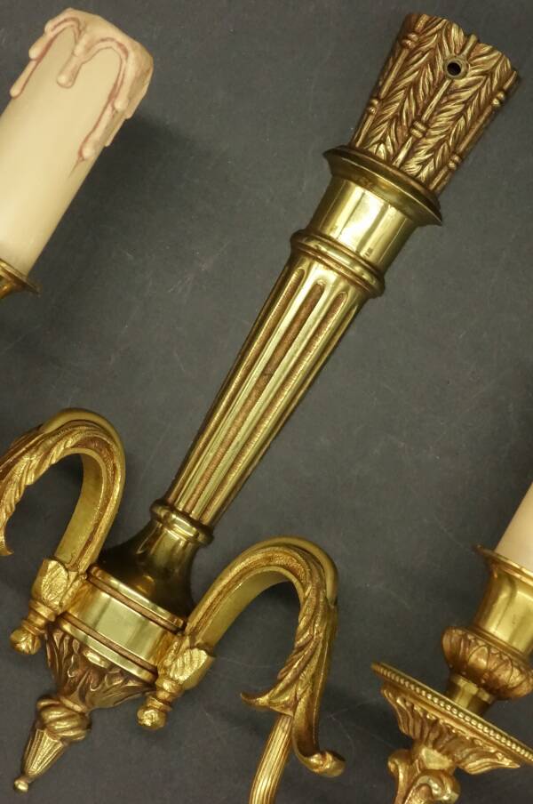 Pair of Louis XVI style quiver sconces in gilded bronze