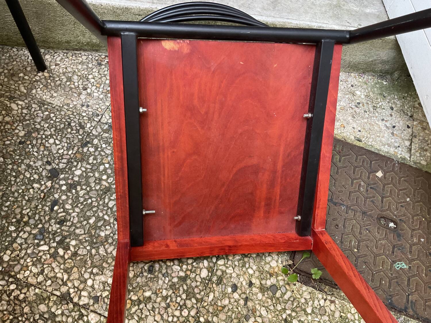 Chair with wooden seat and rare steel back