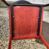 Chair with wooden seat and rare steel back