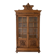 Antique wooden library with a carved pediment.